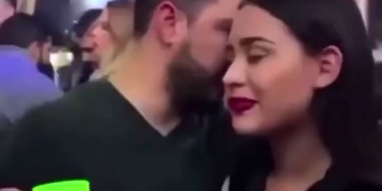 Live Twitter Video of a Guy Talking Into a Girl’s Ear